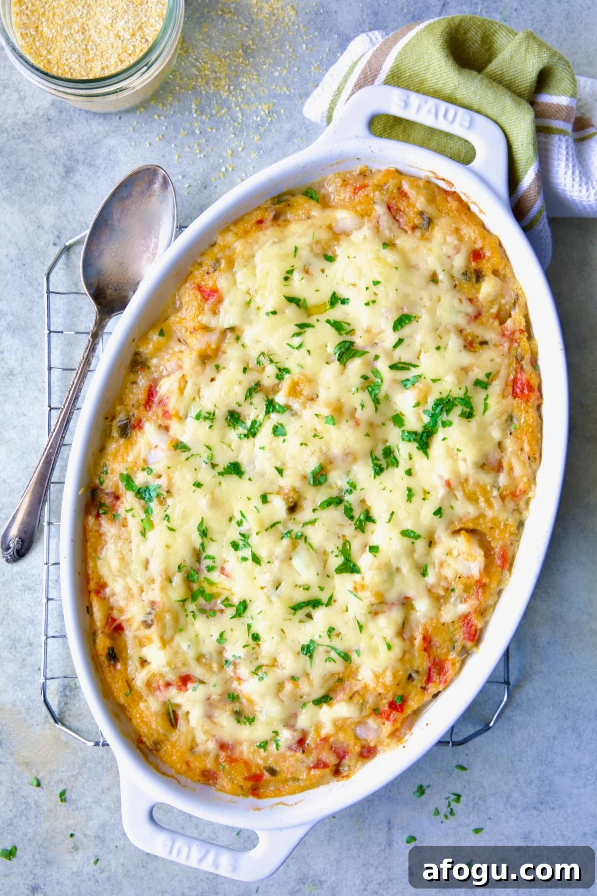 Shrimp and Grits Casserole in white Dutch oven.