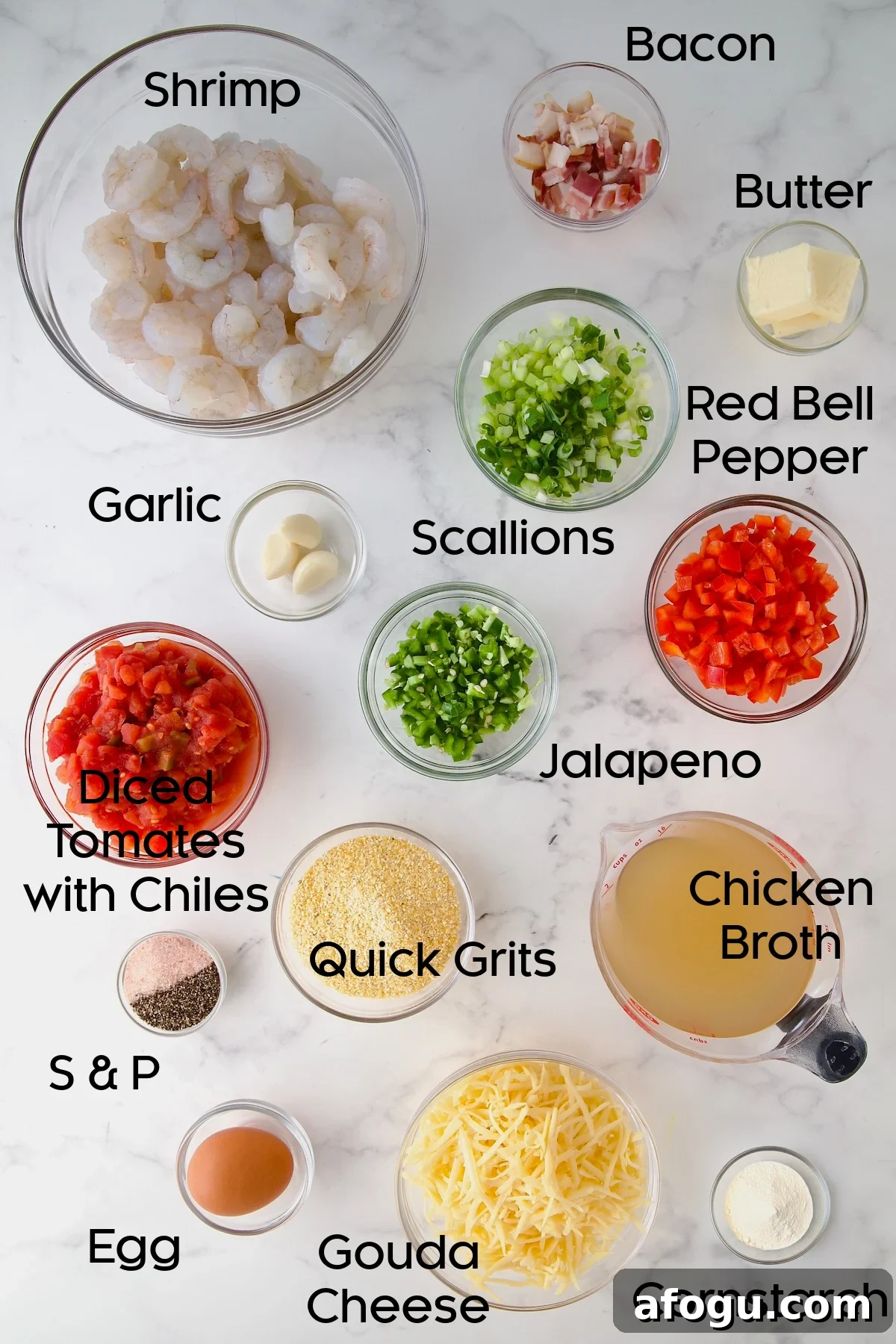 Ingredients for Shrimp and Grits Casserole in glass bowls.