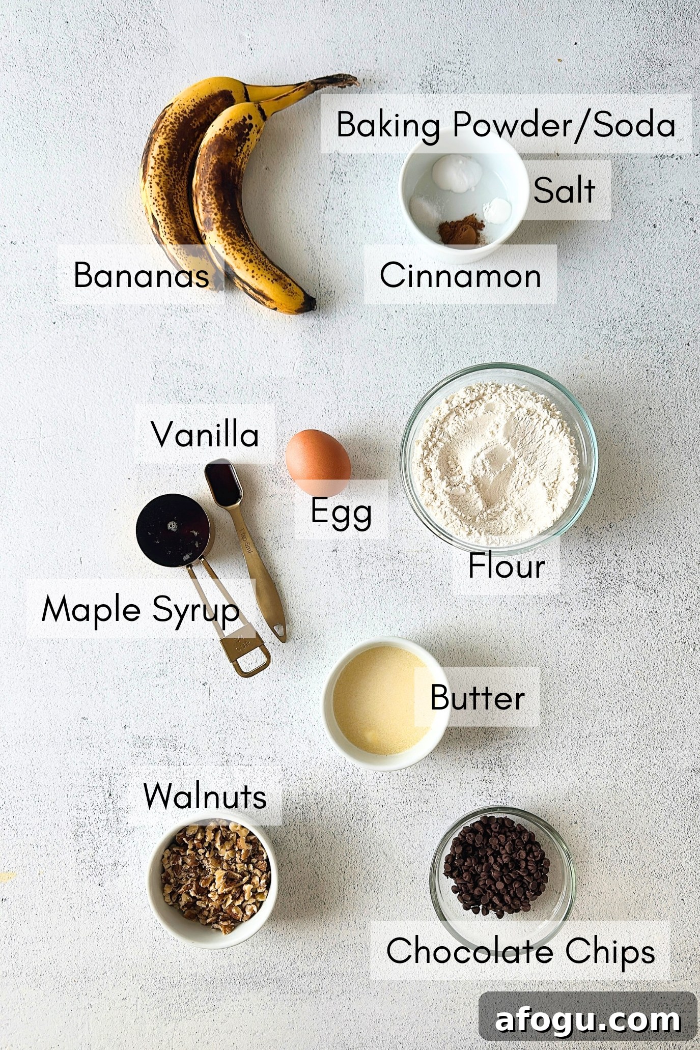 Ingredients to make chocolate chip banana walnut muffins.