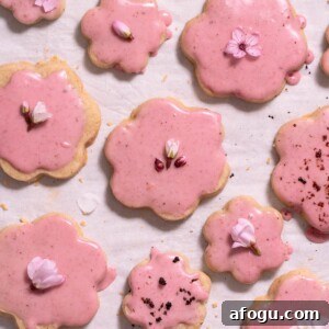 Magnolia shortbread cookies with blood orange glaze and edible flowers