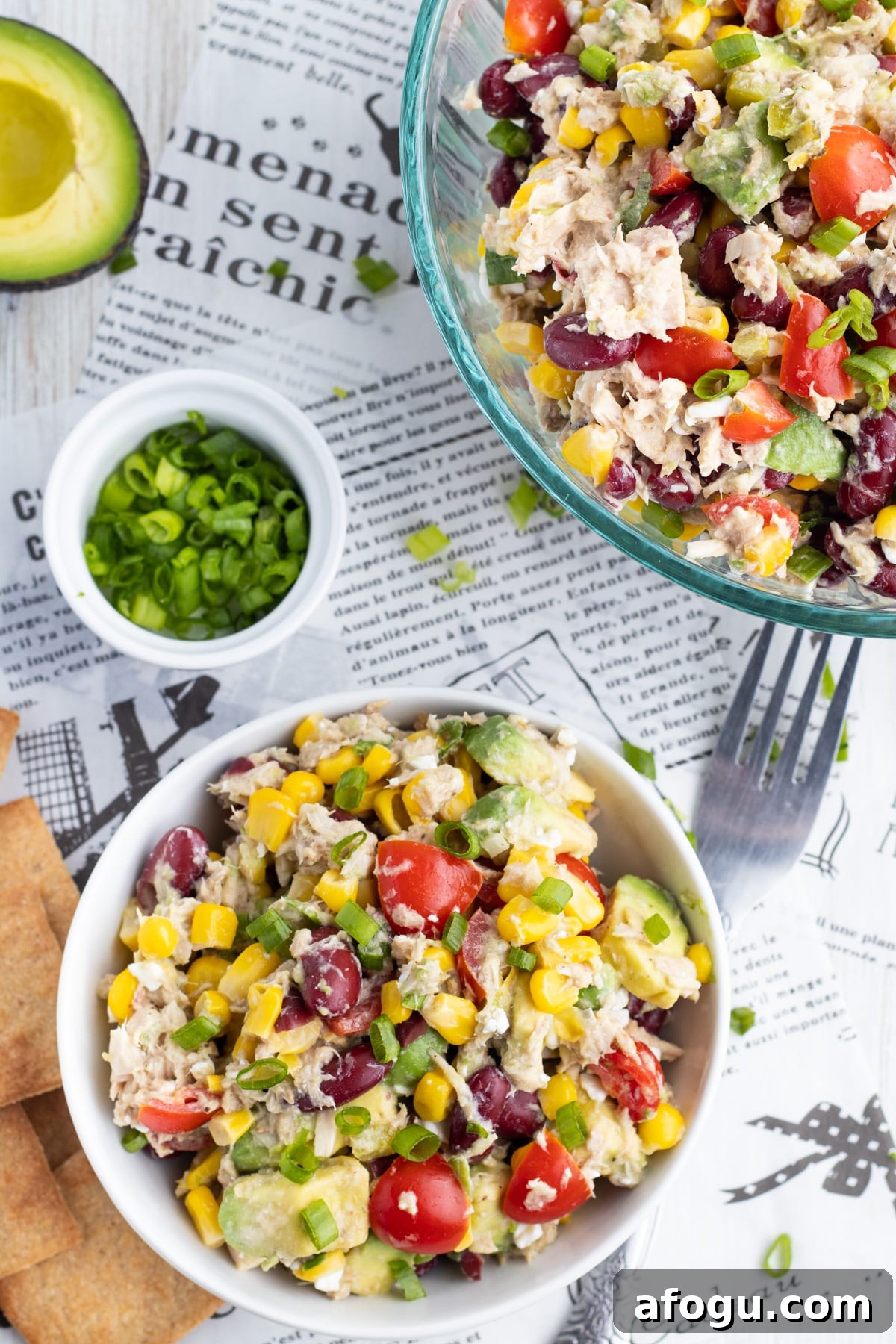 Tuna, Corn, Avocado & White Bean Salad with Zesty Dressing 3 Picture of the tuna and bean salad, a little bowl of green onions and crackers.