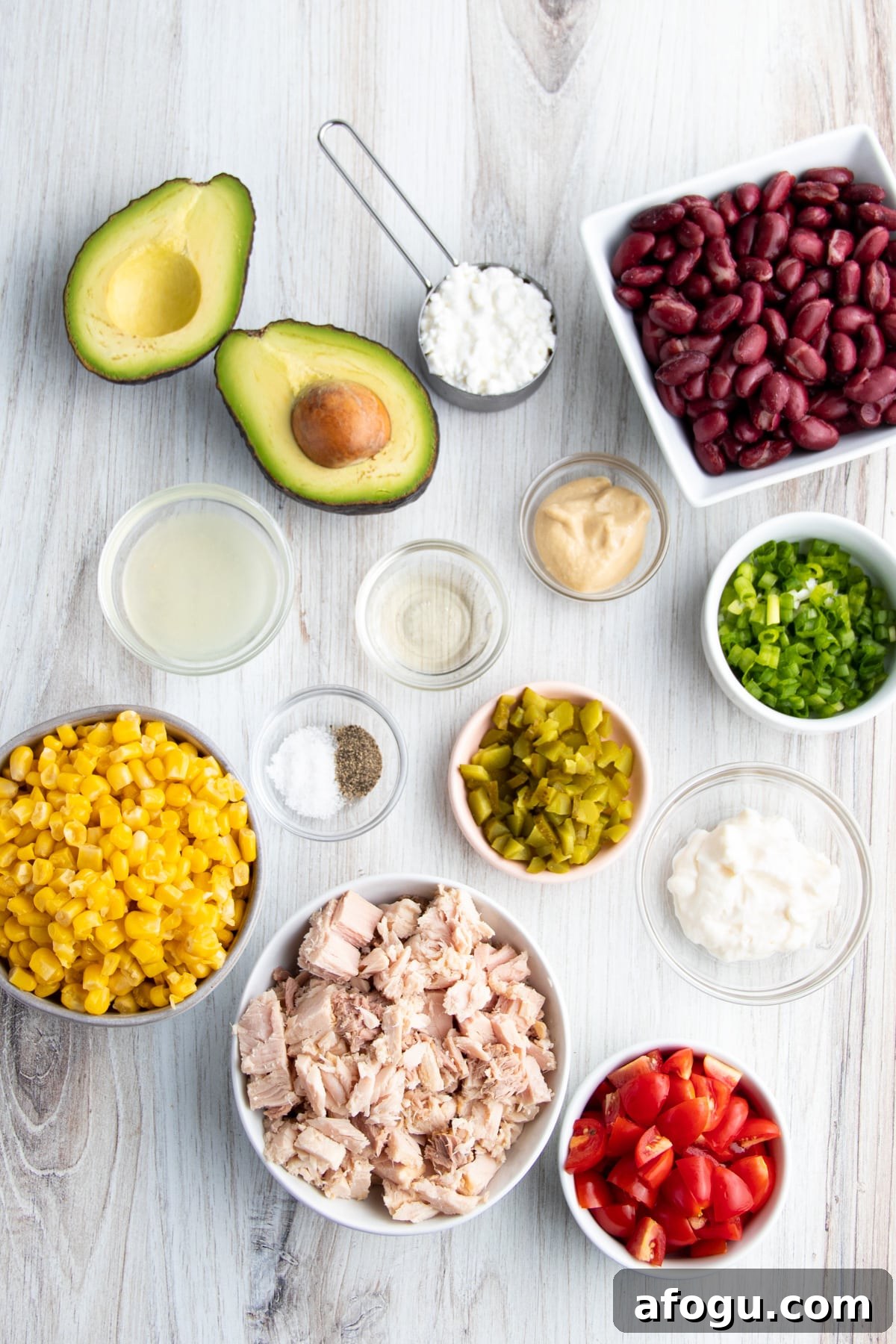 Tuna, Corn, Avocado & White Bean Salad with Zesty Dressing 4 Image of all individual ingredients used in the tuna salad.