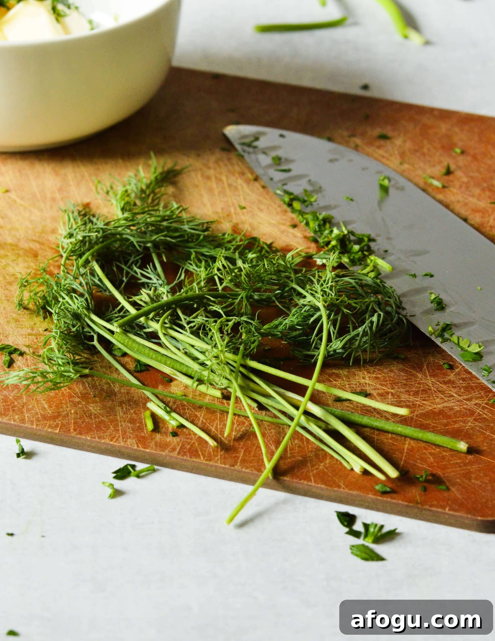 fresh dill on a cutting board. 