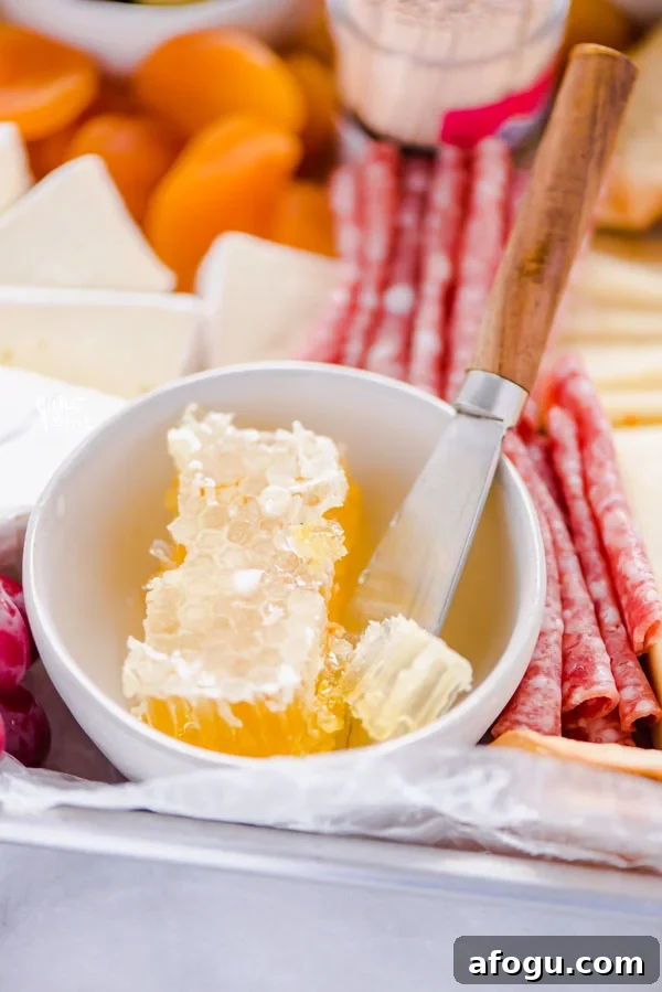 close up shot of honey comb in a small white bowl
