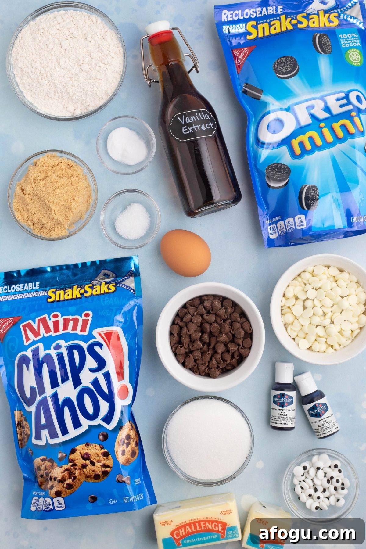 Ingredients needed to make cookie monster cookies measured on a  light blue table. 