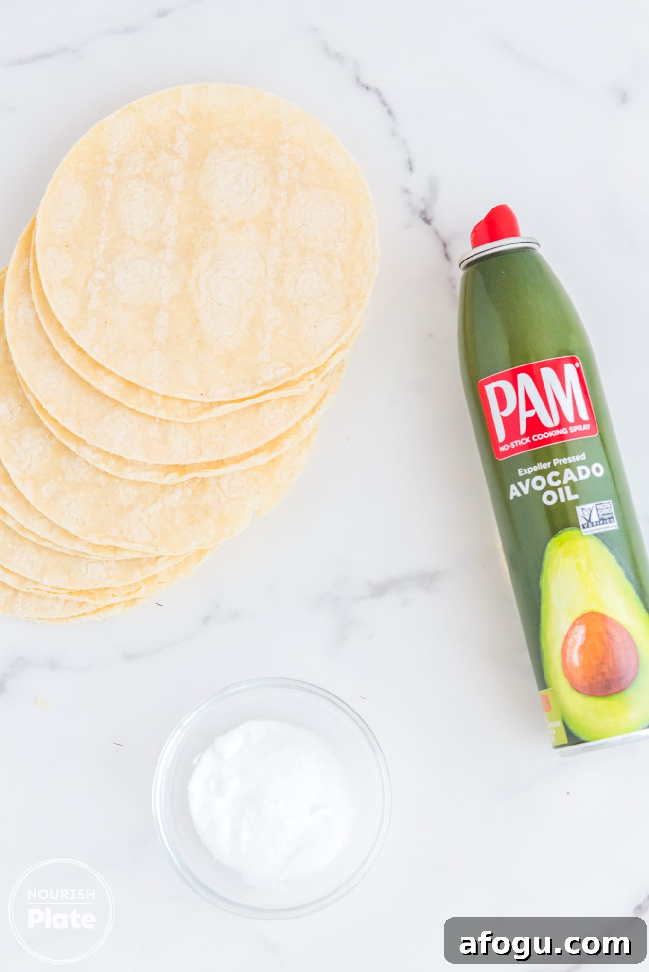 Crispy Air Fryer Tortilla Chips Recipe for Homemade Snacking 3 Ingredients needed to make air fryer tortilla chips including tortillas, avocado oil, and salt