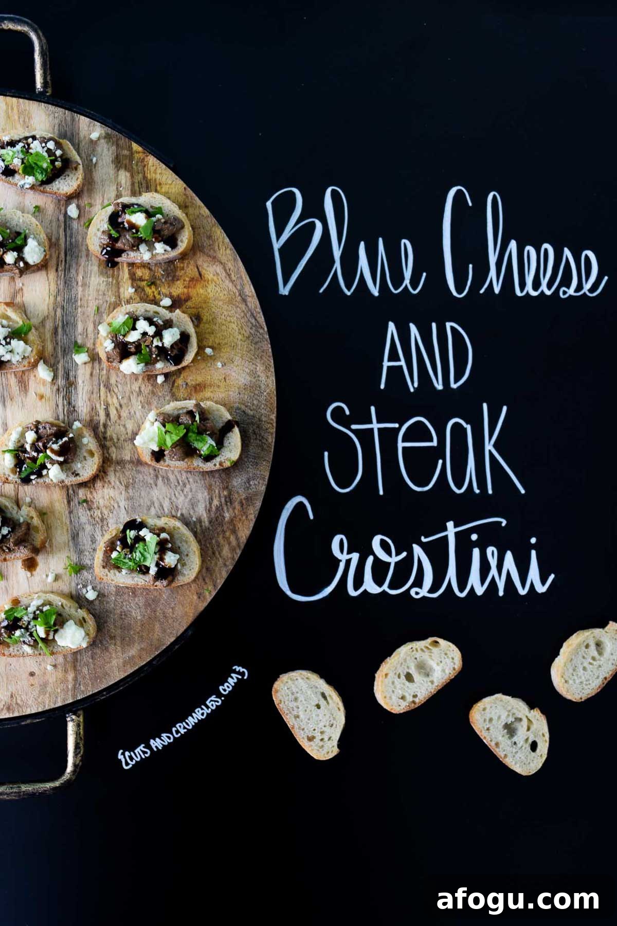 Blue Cheese and Steak Crostini on wooden platter with title written on chalkboard