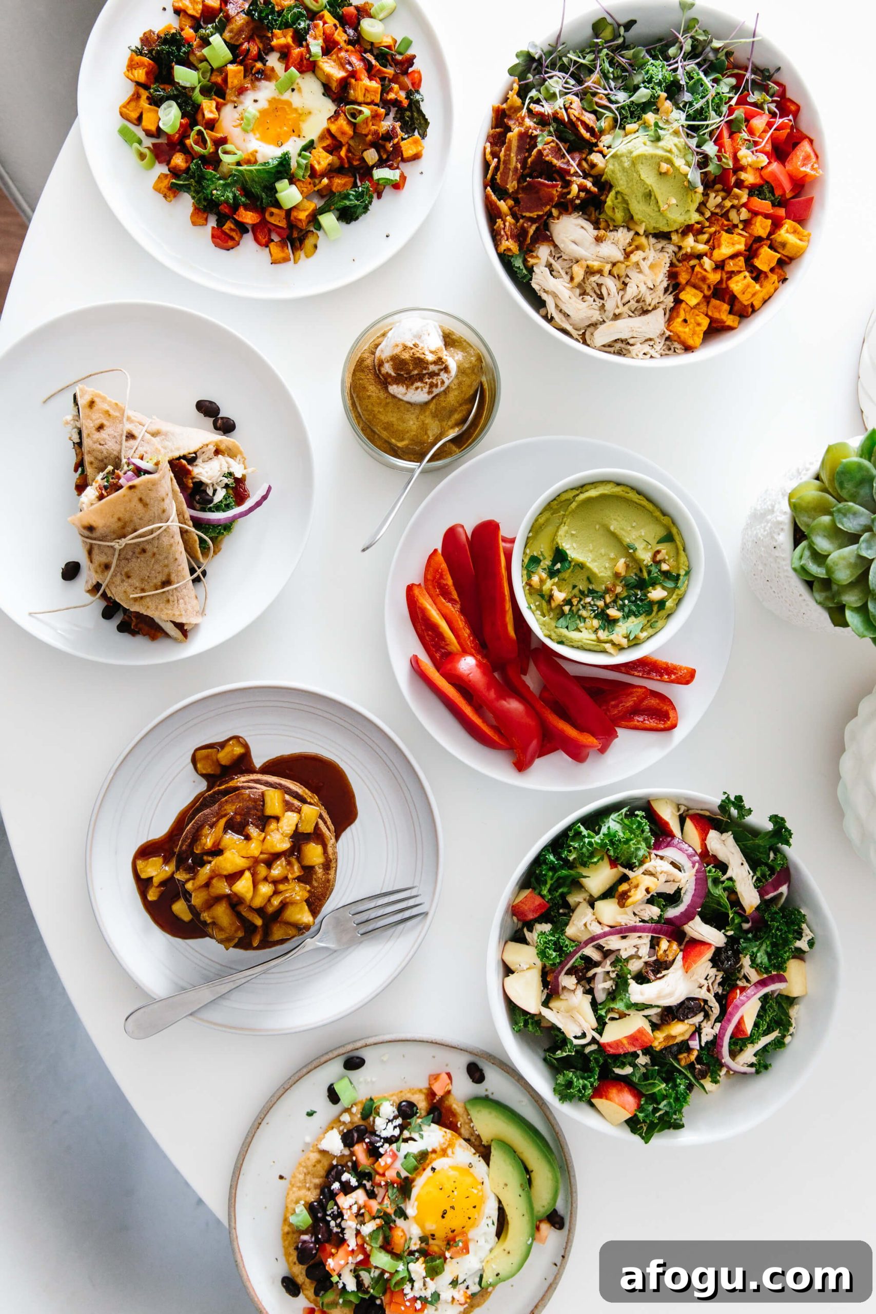 Meal prep ideas and recipes for fall! Delicious seasonal produce turned into healthy fall recipes! Several meals prepped on a table.