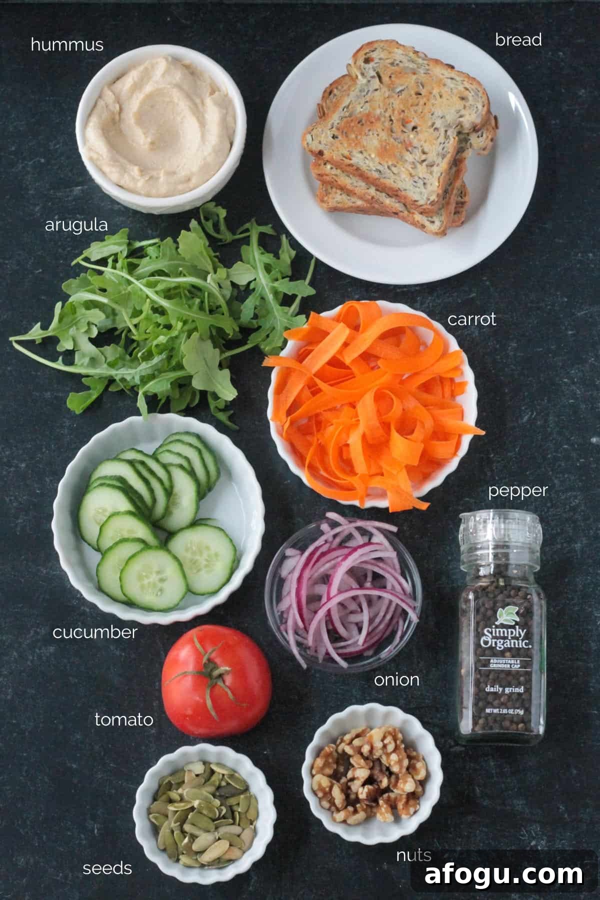10 Creative Hummus Toast Recipes for Quick Snacks 3 Recipe ingredients arrayed in individual bowls.