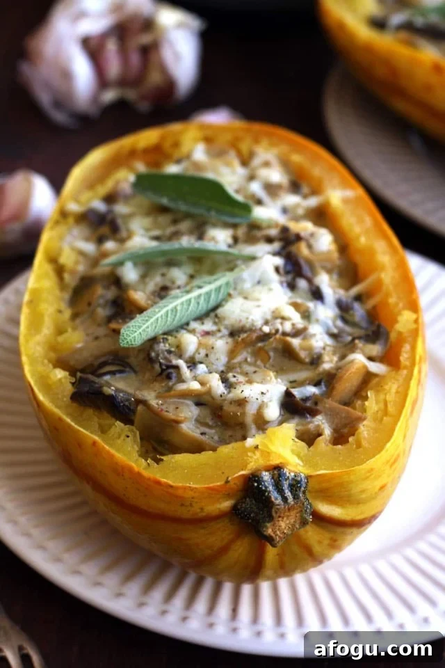 Roasted Spaghetti Squash with Mushrooms on the Table with Garlic Cloves in the Background