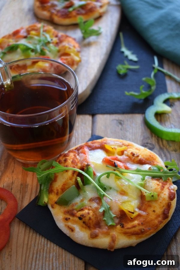 bell pepper mini pizzas on a table
