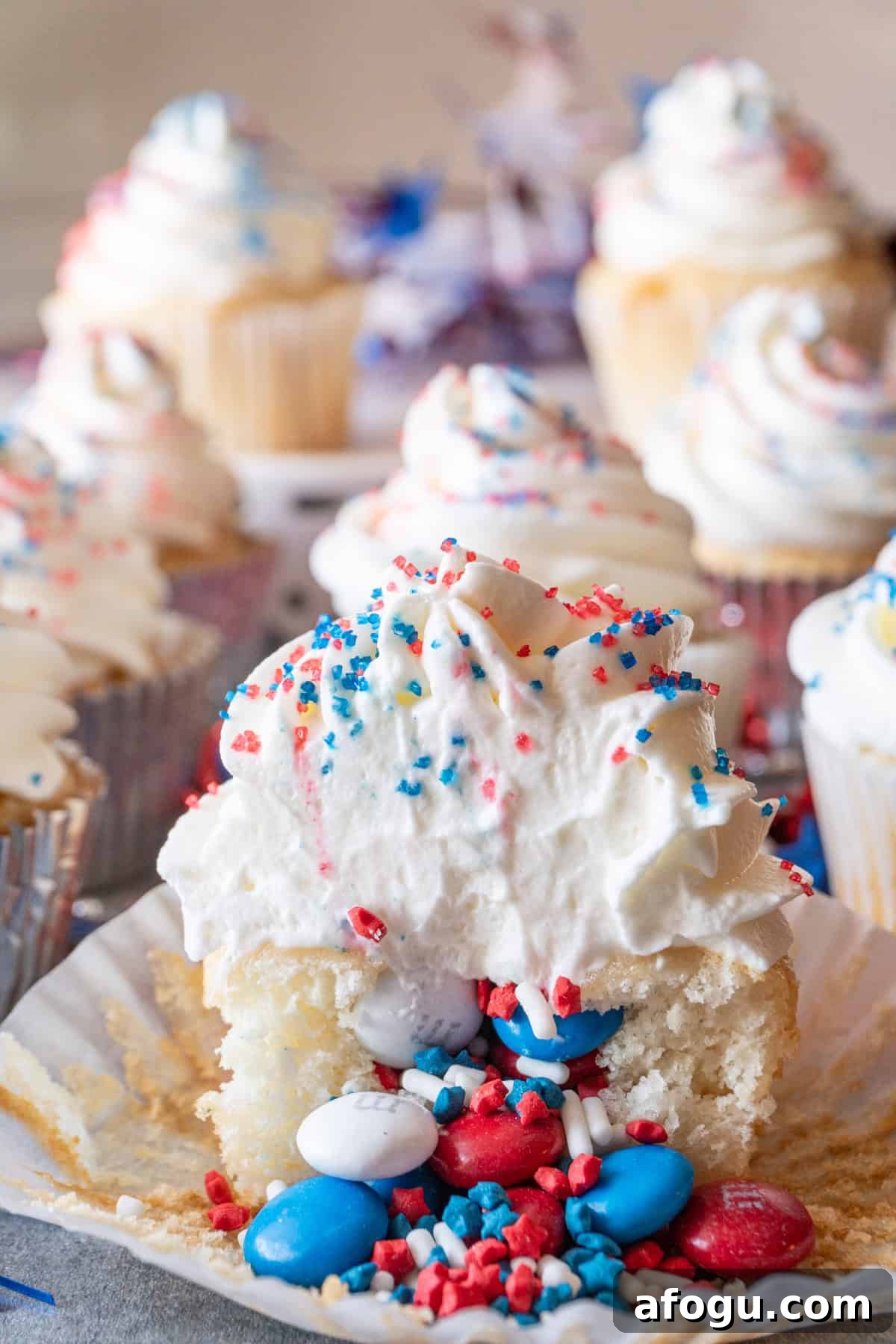 red white and blue sprinkles filled cupcake