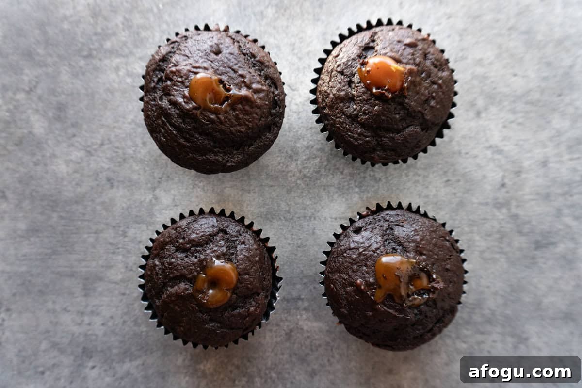 cupcakes with caramel filling the holes
