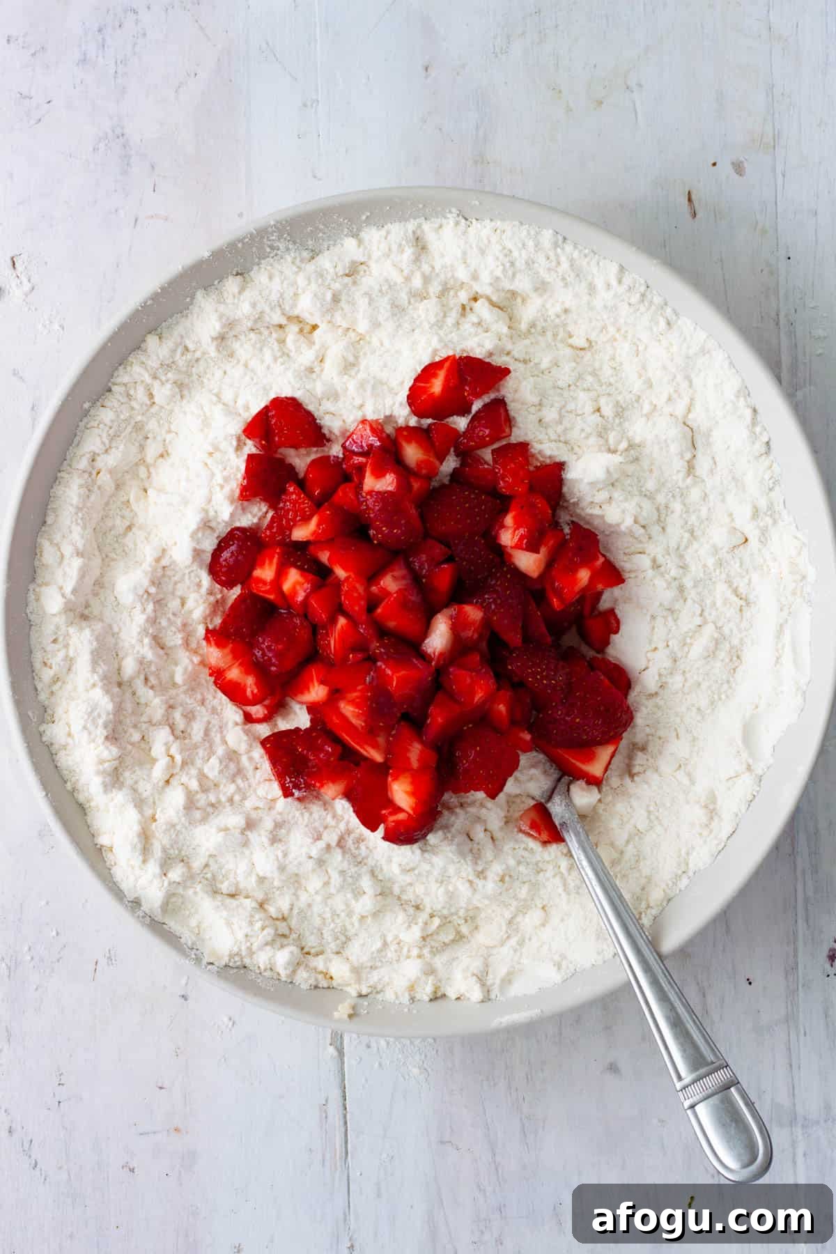 Chopped strawberries added to the base for biscuit batter.