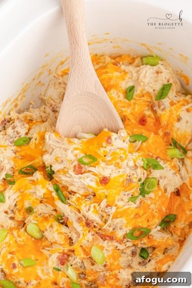 Crock Pot Crack Chicken is a heavenly dish featuring everyone's favorite chicken breasts, cream cheese, ranch seasoning, and bacon!