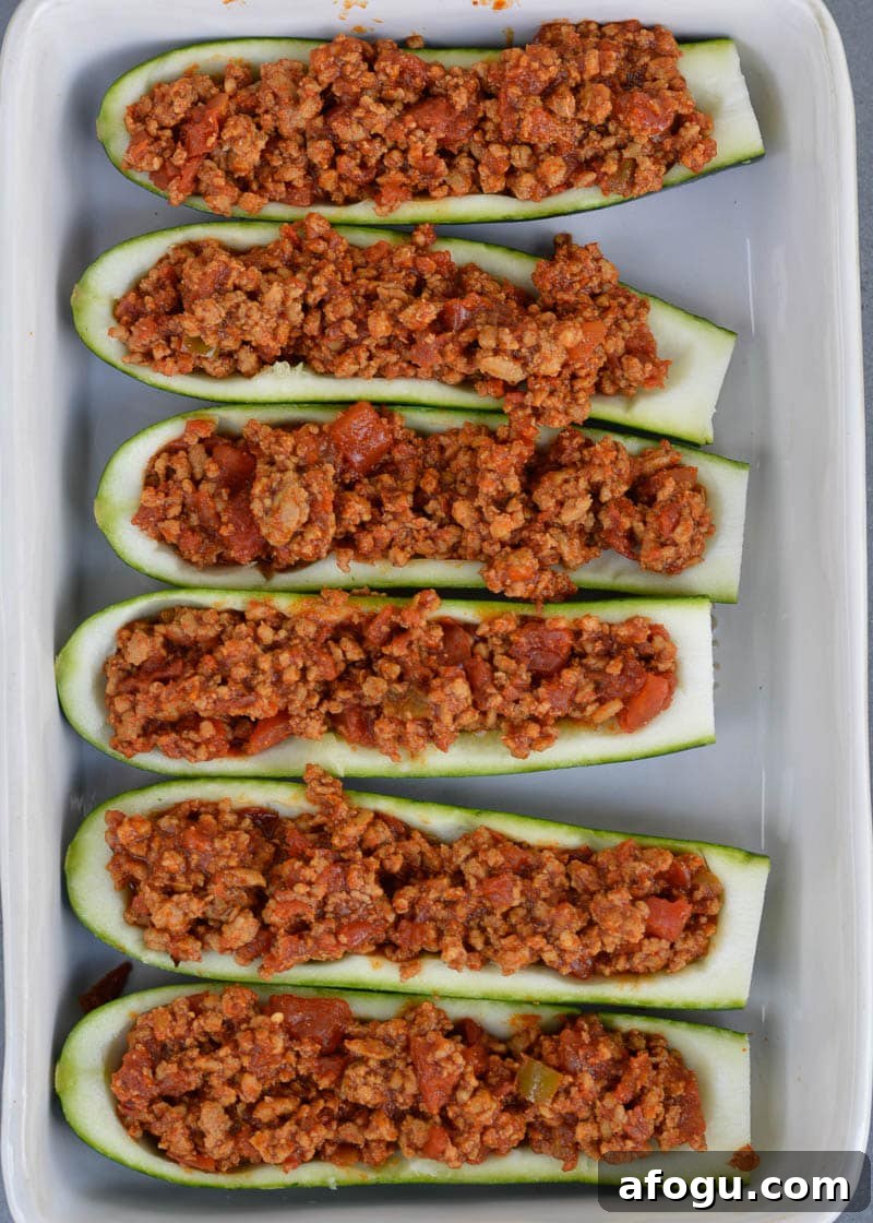 Chili Cheese Stuffed Zucchini Boats