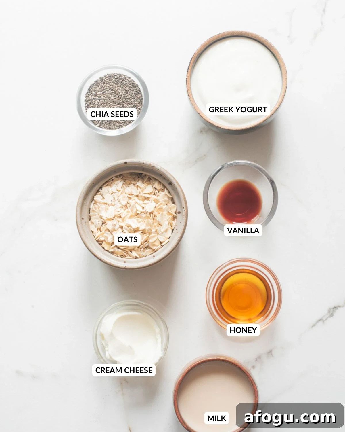 Strawberry Cheesecake Overnight Oats Recipe for Creamy Make-Ahead Breakfast 4 Overhead view of ingredients for strawberry cheesecake oats