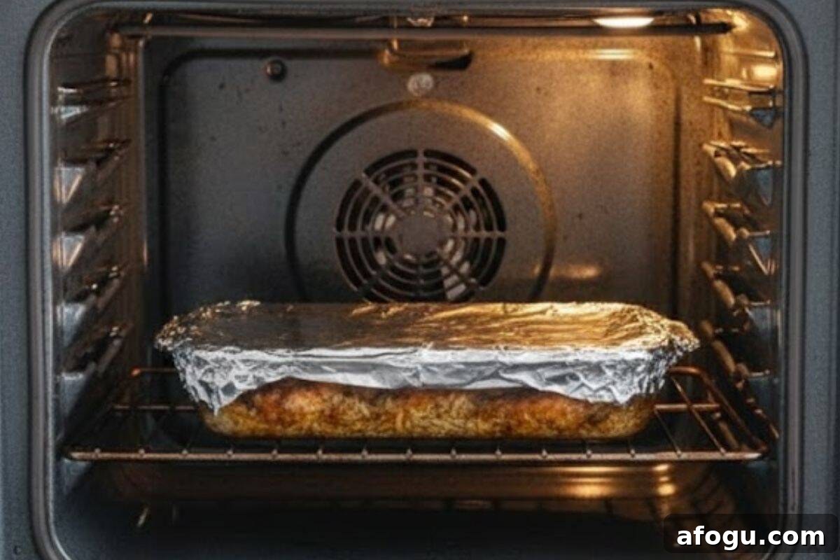 Crispy Oven-Baked Chicken with Garlic Rice Recipe 6 Arrange seasoned chicken over the rice, cover with foil and bake.