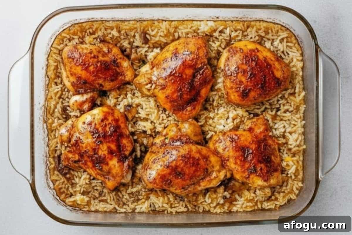 Crispy Oven-Baked Chicken with Garlic Rice Recipe 7 Remove from oven, rest chicken, fluff rice and return chicken on top.