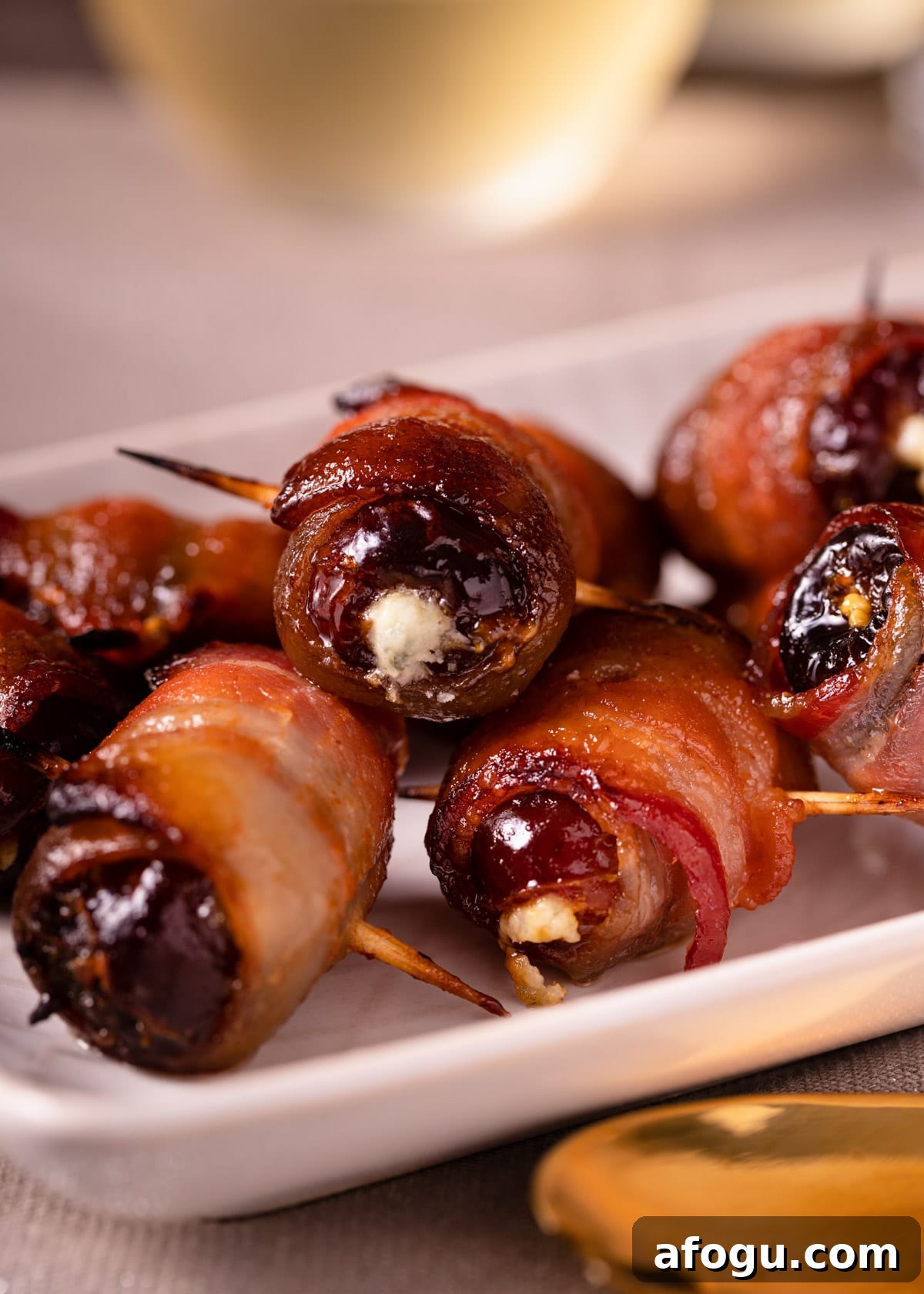 closeup of devils on horseback on a white platter