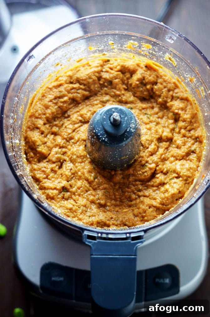 Eggplant Parmesan Dip. This warm, cheesy dip is loaded up with tomato sauce, garlic, and roasted eggplant. I love making it for winter parties. | hostthetoast.com