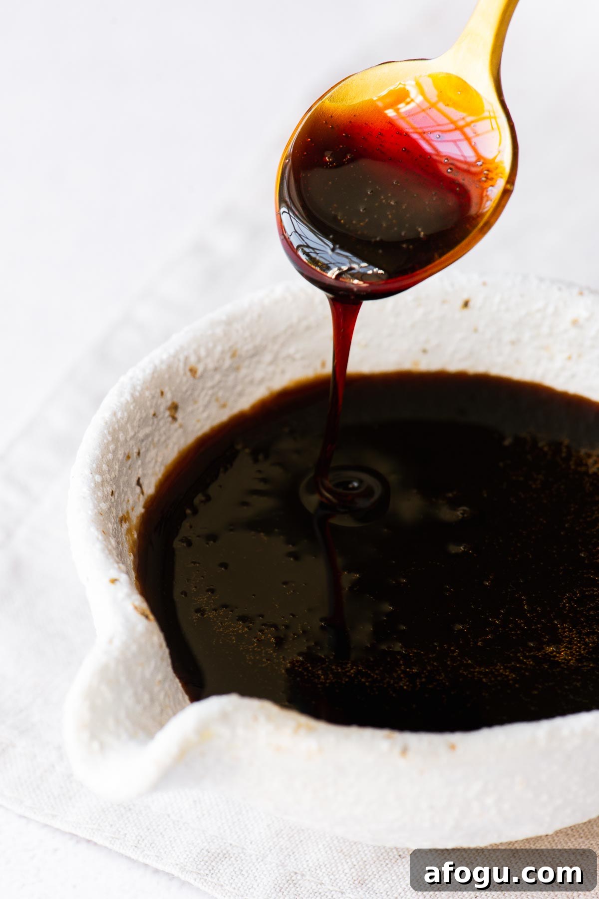 Sweet Soy Sauce Substitute: How to Replace Kecap Manis in Recipes 2 Homemade sweet soy sauce substitute (Indonesian kecap manis) drizzling from a teaspoon into a soy sauce pourer.