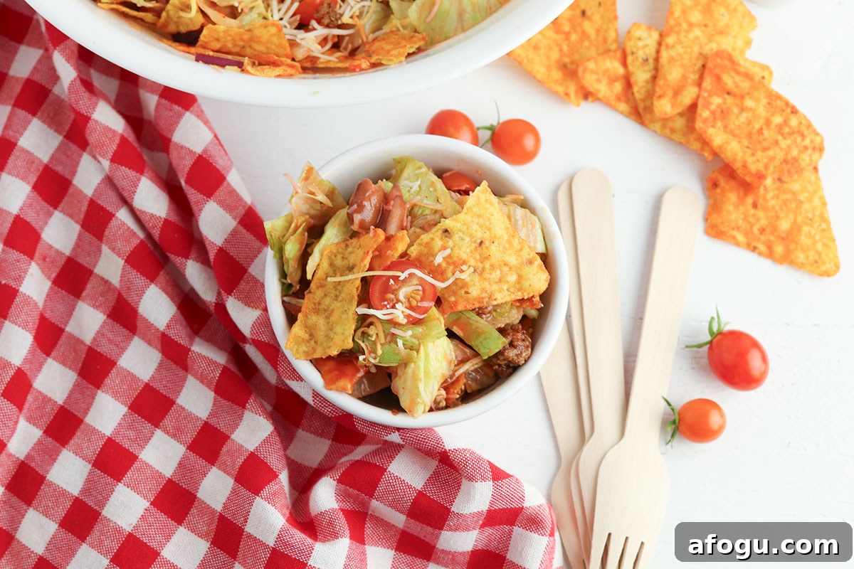 A serving of Dorito Taco Salad in salad bowl.