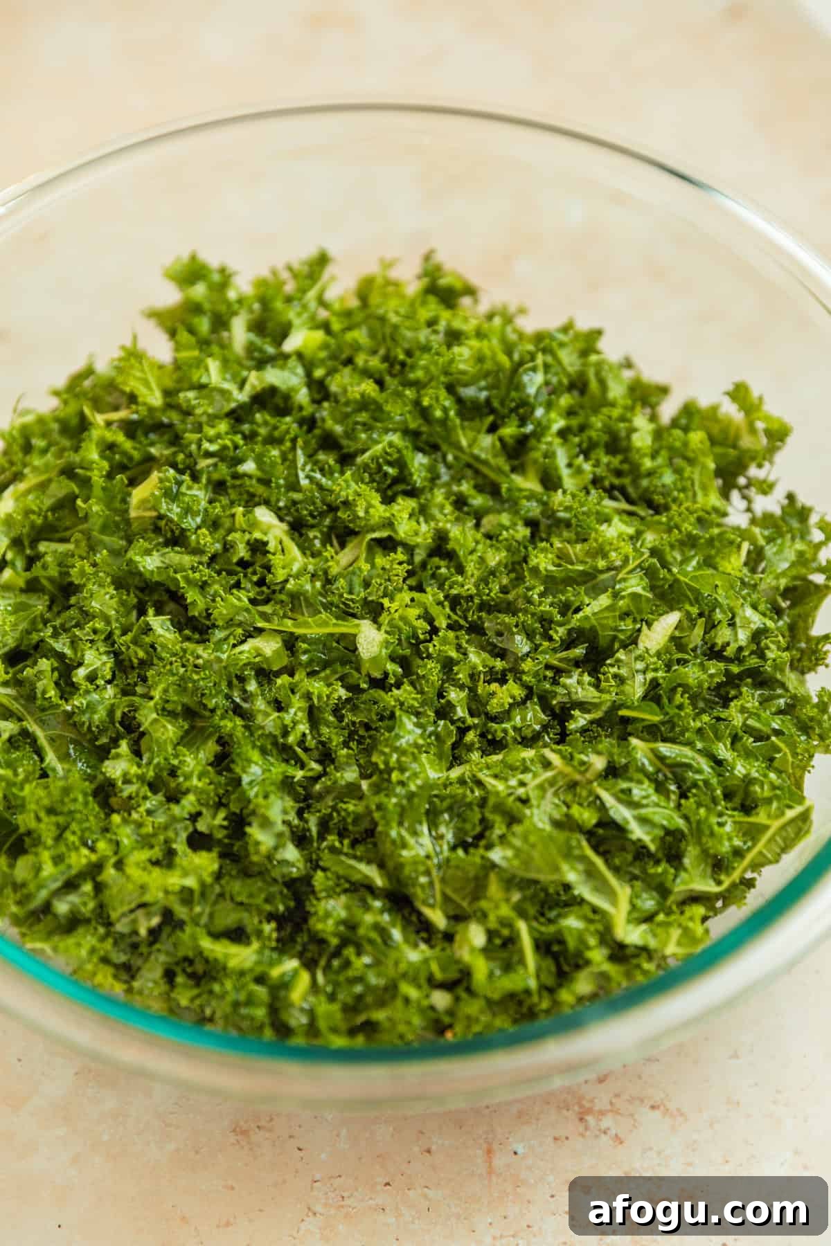 Chopped kale massaged in oil and salt.