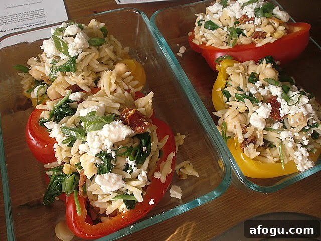 Orzo and feta stuffed peppers in pyrex.