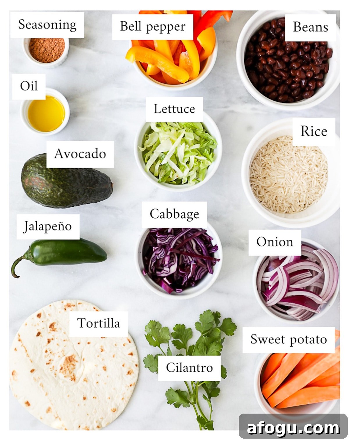 Ingredients for a plant based burrito including: seasoning, oil, avocado, jalapeno, tortillas, bell pepper, lettuce, cabbage, cilantro, beans, rice, onion, and sweet potato.