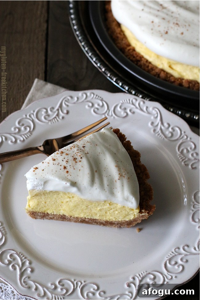 Slice of Gluten-free Eggnog Pie on plate with pie in background