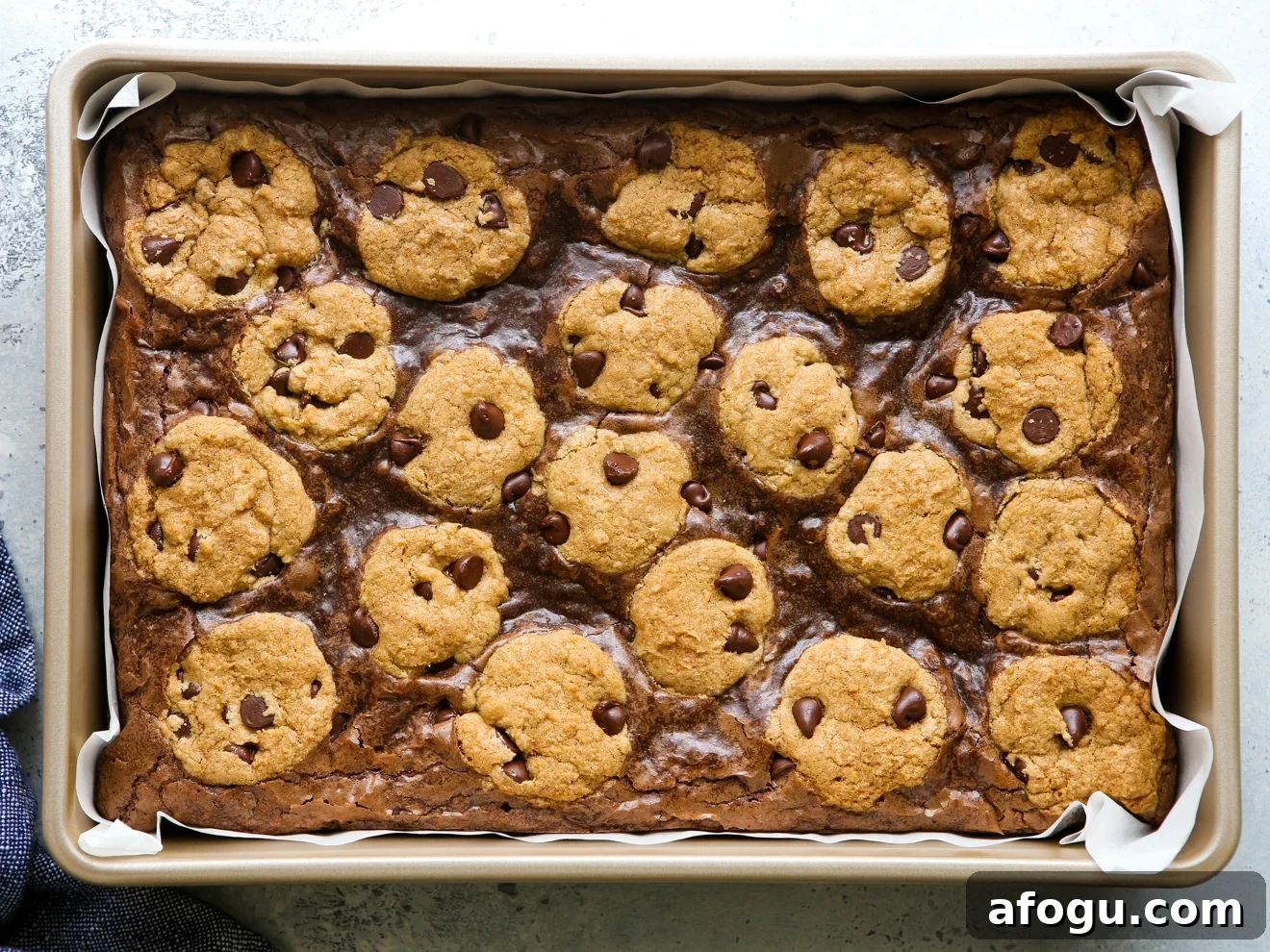 baked chocolate chip cookie brownies in pan