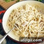 A pan of pasta in a creamy Boursin sauce.