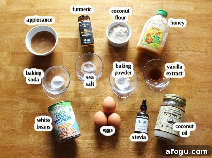 Vanilla cupcake ingredients on a table.