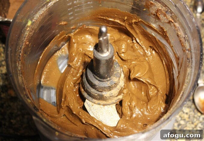 Avocado chocolate frosting in a blender.