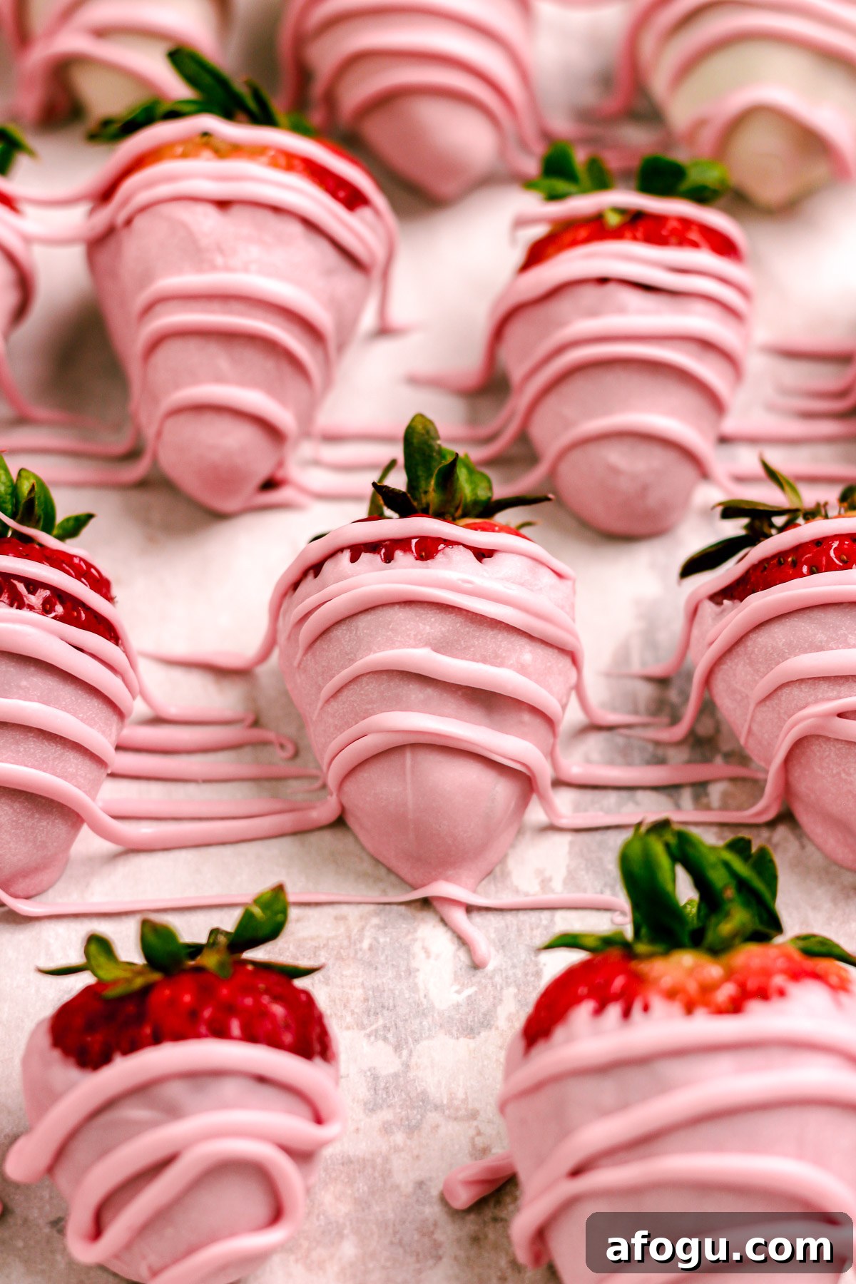 Decorated pink chocolate strawberries