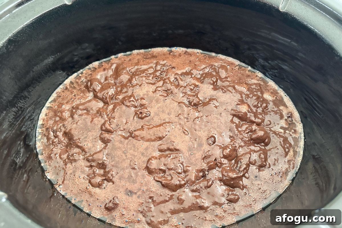 Gluten-Free Slow Cooker Chocolate Lava Cake Recipe 4 The lava cake batter and pudding in the slow cooker.