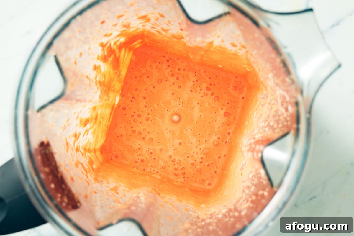 Roasted red pepper crema in a blender after blending.