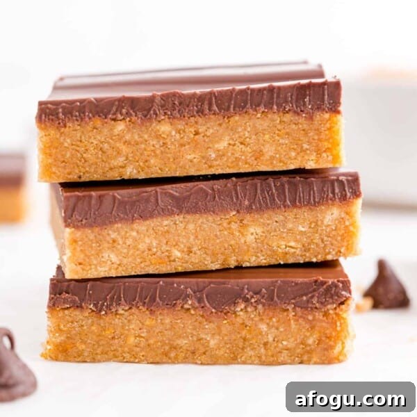 Stack of three peanut butter and chocolate bars.