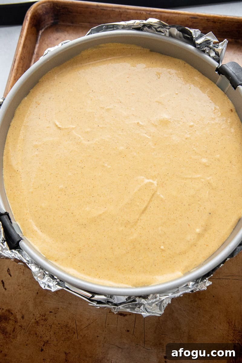 Unbaked cheesecake in a pan