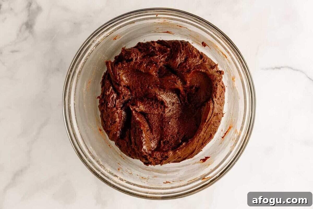 Cake mix brownie batter in bowl.