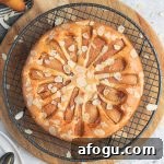 Pear Almond Cake from above on a cooling rack