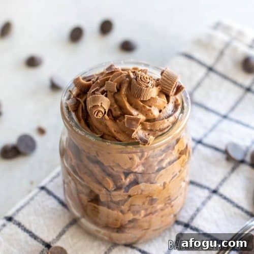 3 ingredient chocolate mousse in a small jar topped with chocolate shavings