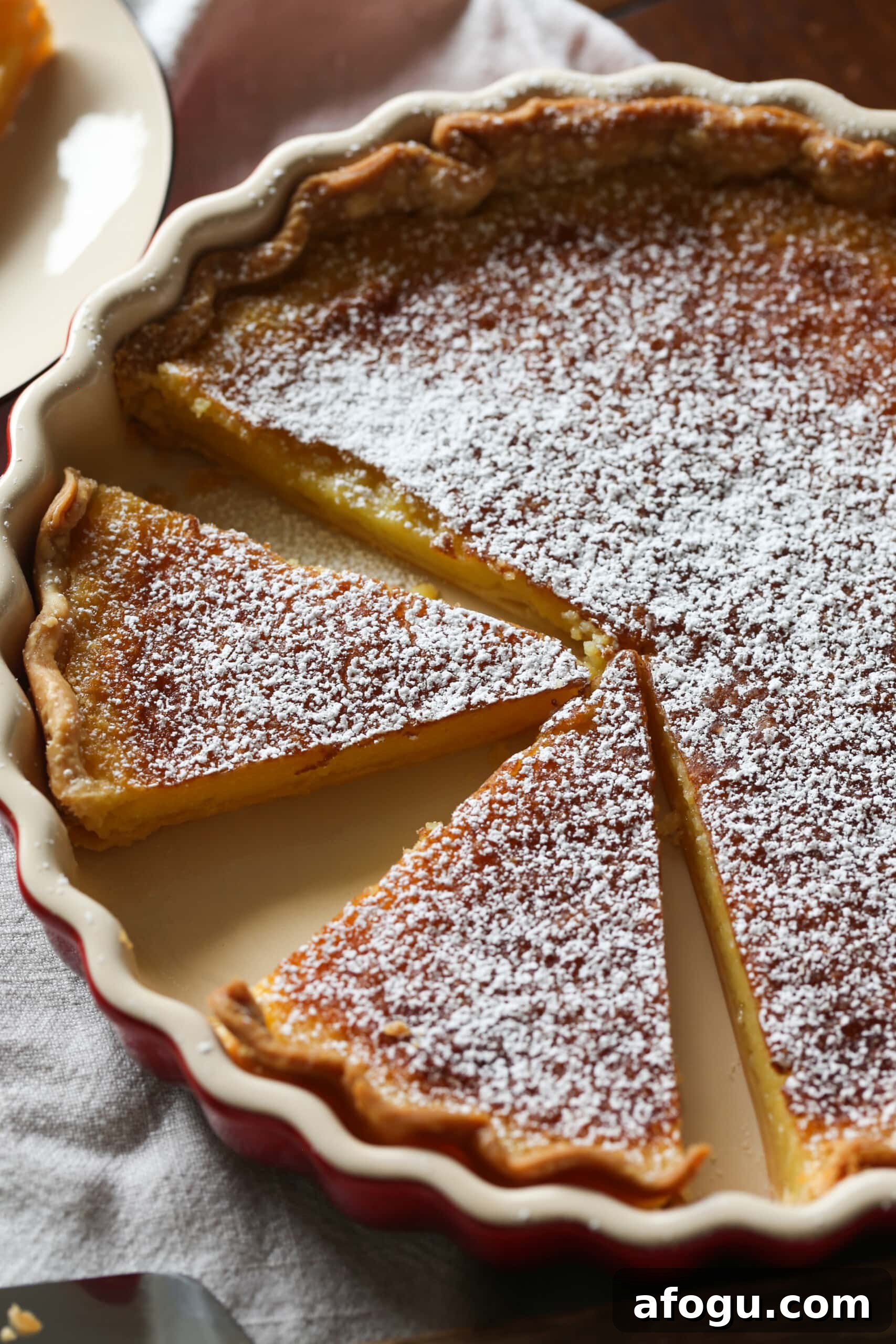 Classic Lemon Chess Pie Recipe — Tangy Southern Dessert 3 Lemon Chess Pie sliced in a pie pan