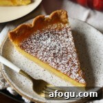 A slice of Lemon Chess Pie on a plate