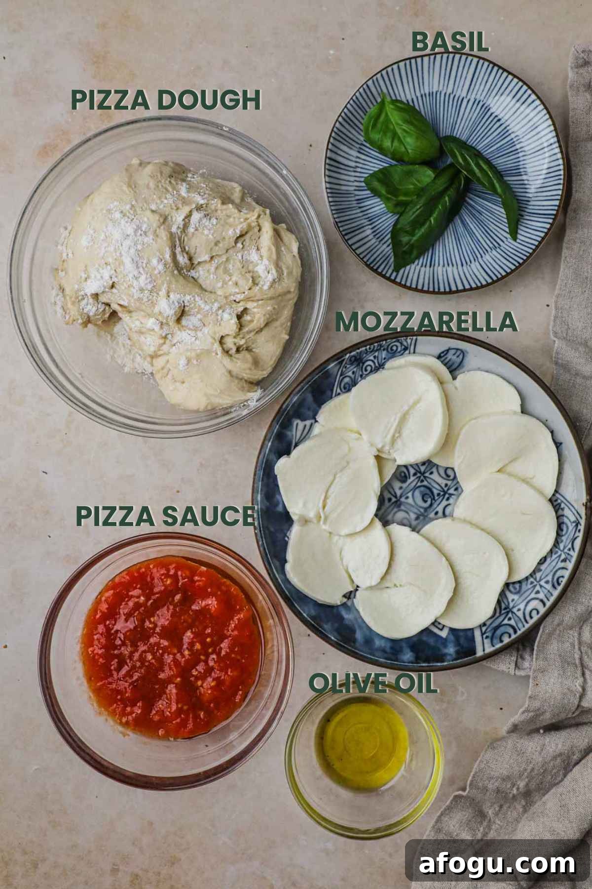 Homemade Margherita Pizza Recipe: Classic Neapolitan Flavor at Home 3 Ingredients to make homemade margherita pizza: pizza dough, basil, mozzarella, pizza sauce, olive oil.