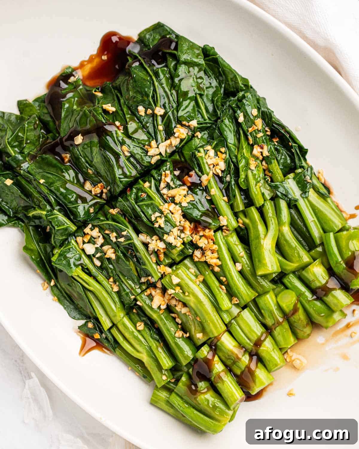 Plate of Chinese Broccoli with oyster sauce and garlic.