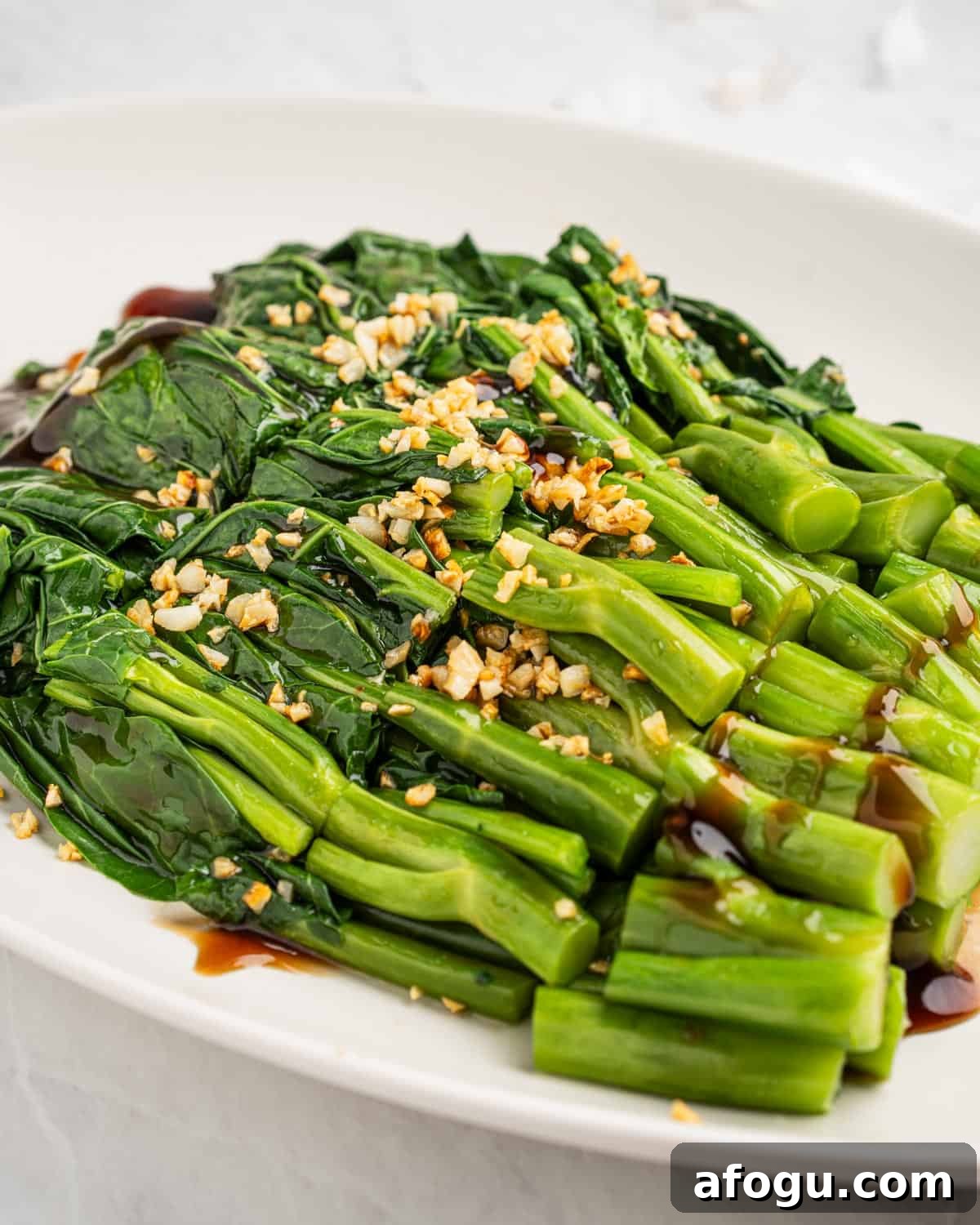 Close up of stir fried Chinese broccoli.