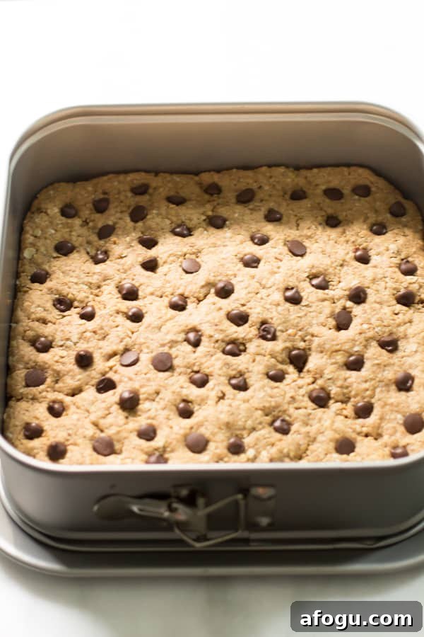 Peanut Butter Chocolate Chip Bars in a baking pan