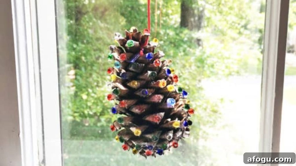 15 Pine Cone Crafts for Rustic Home Decor and Seasonal DIY 8 pine cone sun catcher